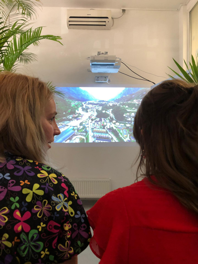 Andreea and Gemma watching the reality wall